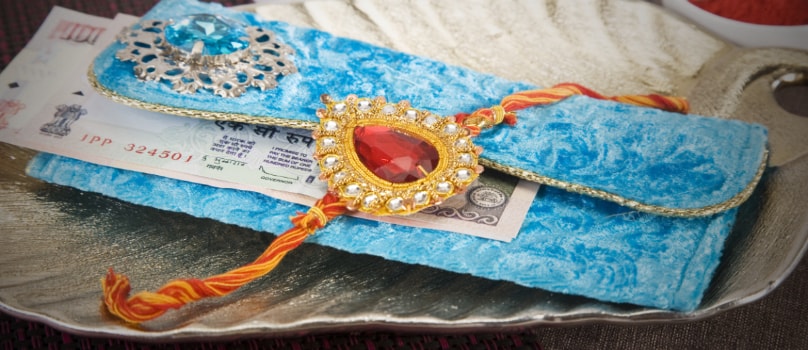 Blue Cover Red Rakhi Blue Cover Red Rakhi
